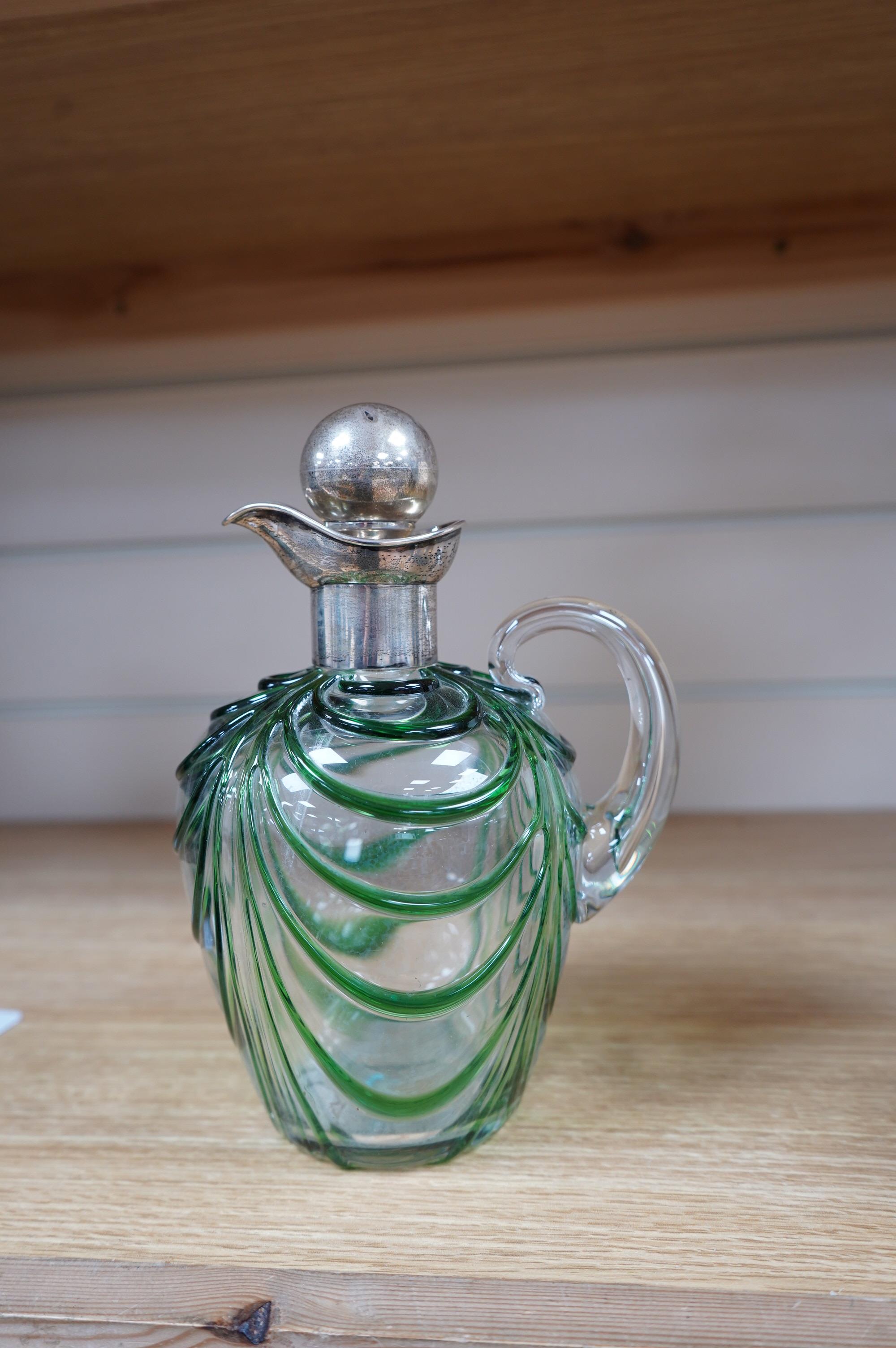 An Art Nouveau silver mounted green overlaid glass liqueur jug, David & Maurice Davis, Birmingham 1904, 20cm high. Condition - good